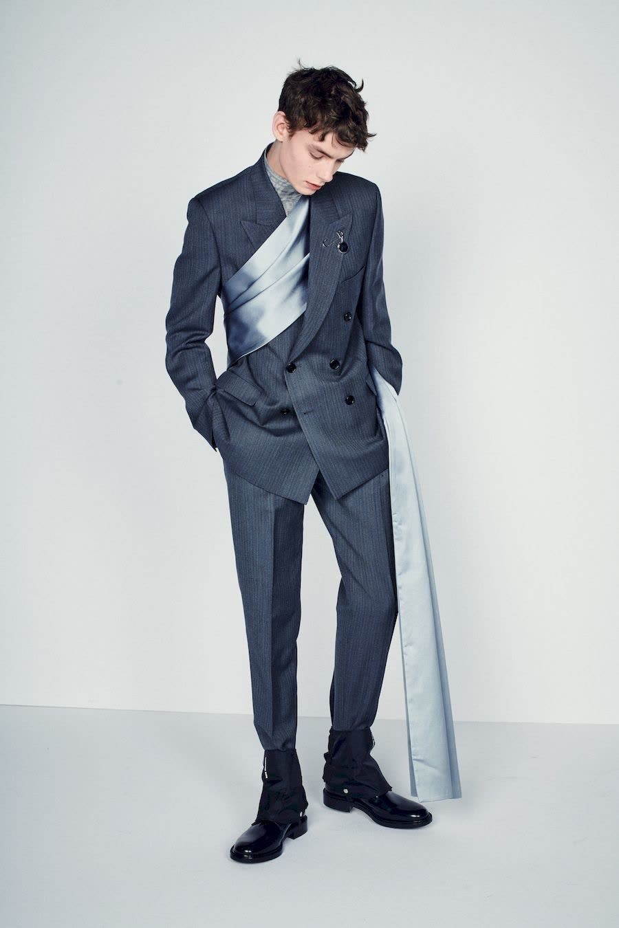 Menswear look, a charcoal double breasted suit with a satin scarf